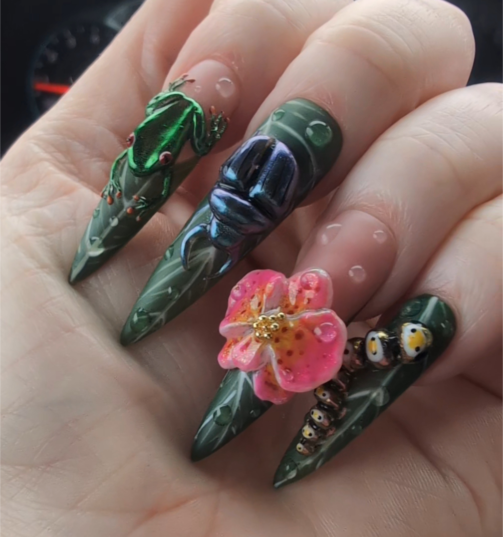 A custom nail set being made